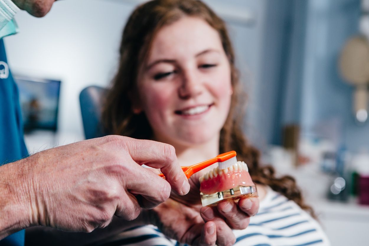 dentist brushing teeth